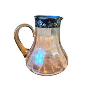Vintage pitcher Amber with black floral design overlay Handle